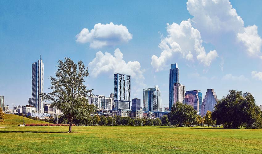 View of Austin skyline during the hot summer from Zilker park