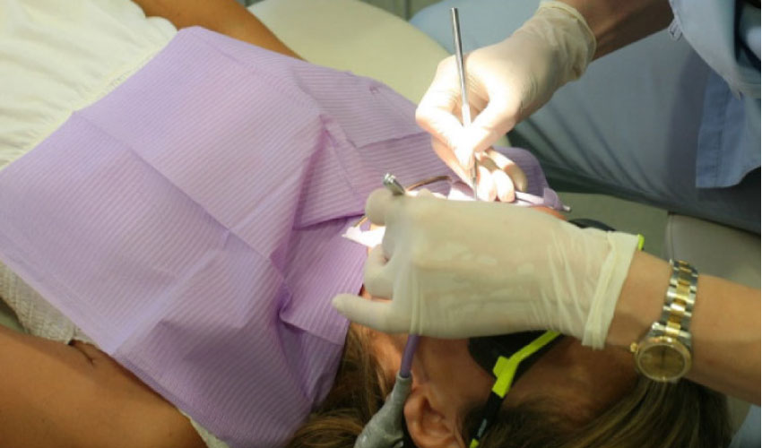 dental patient undergoing wisdom teeth removal